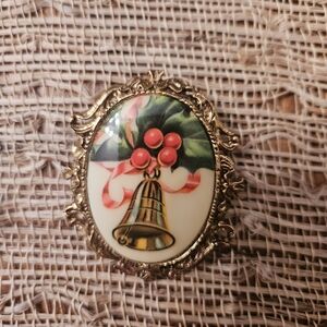 Festive Gold and Cream Brooch with Bell Design